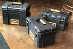 Photo of three toolboxes.